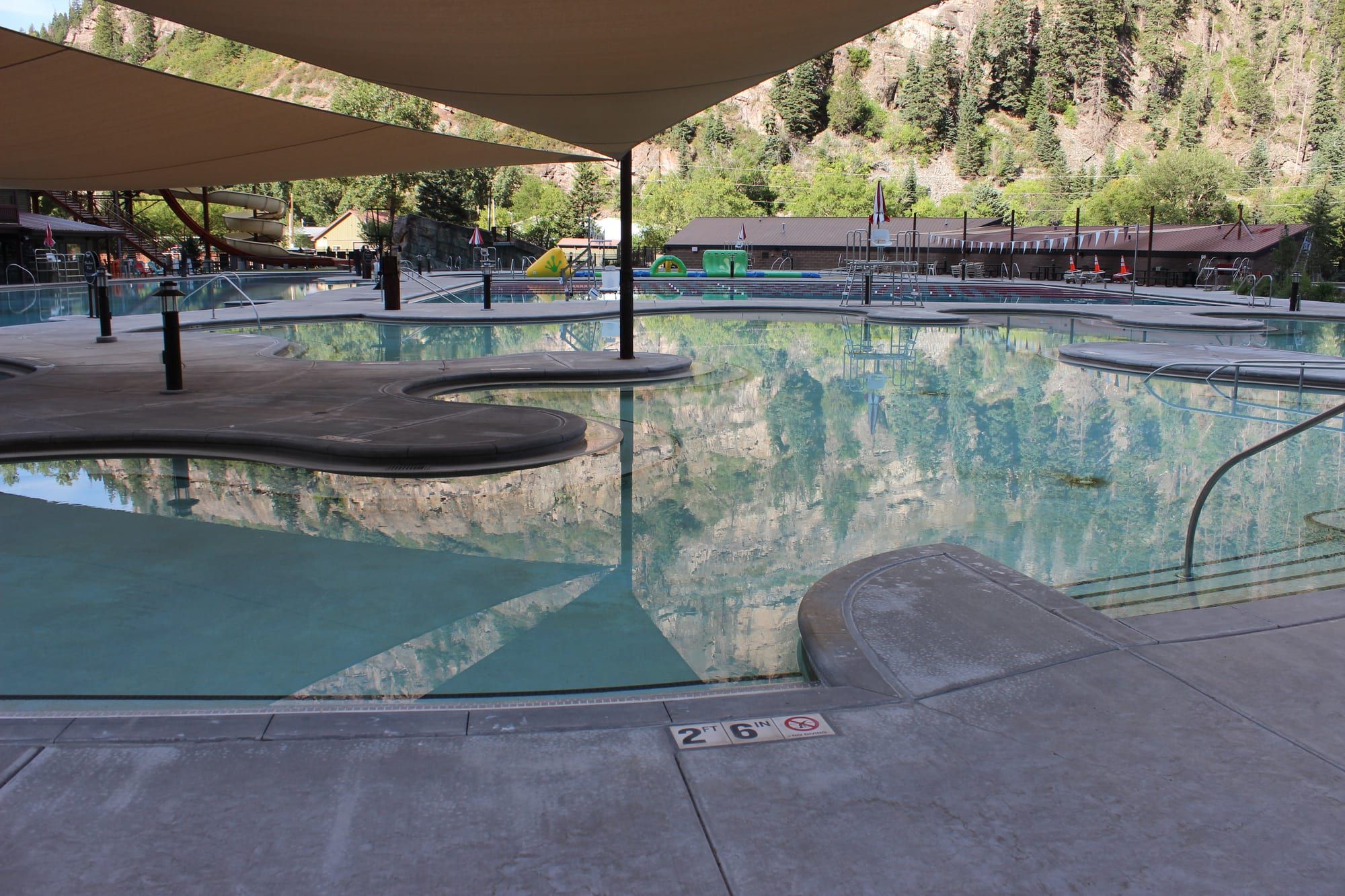 The Ouray Hot Springs Pool with the mountains behind