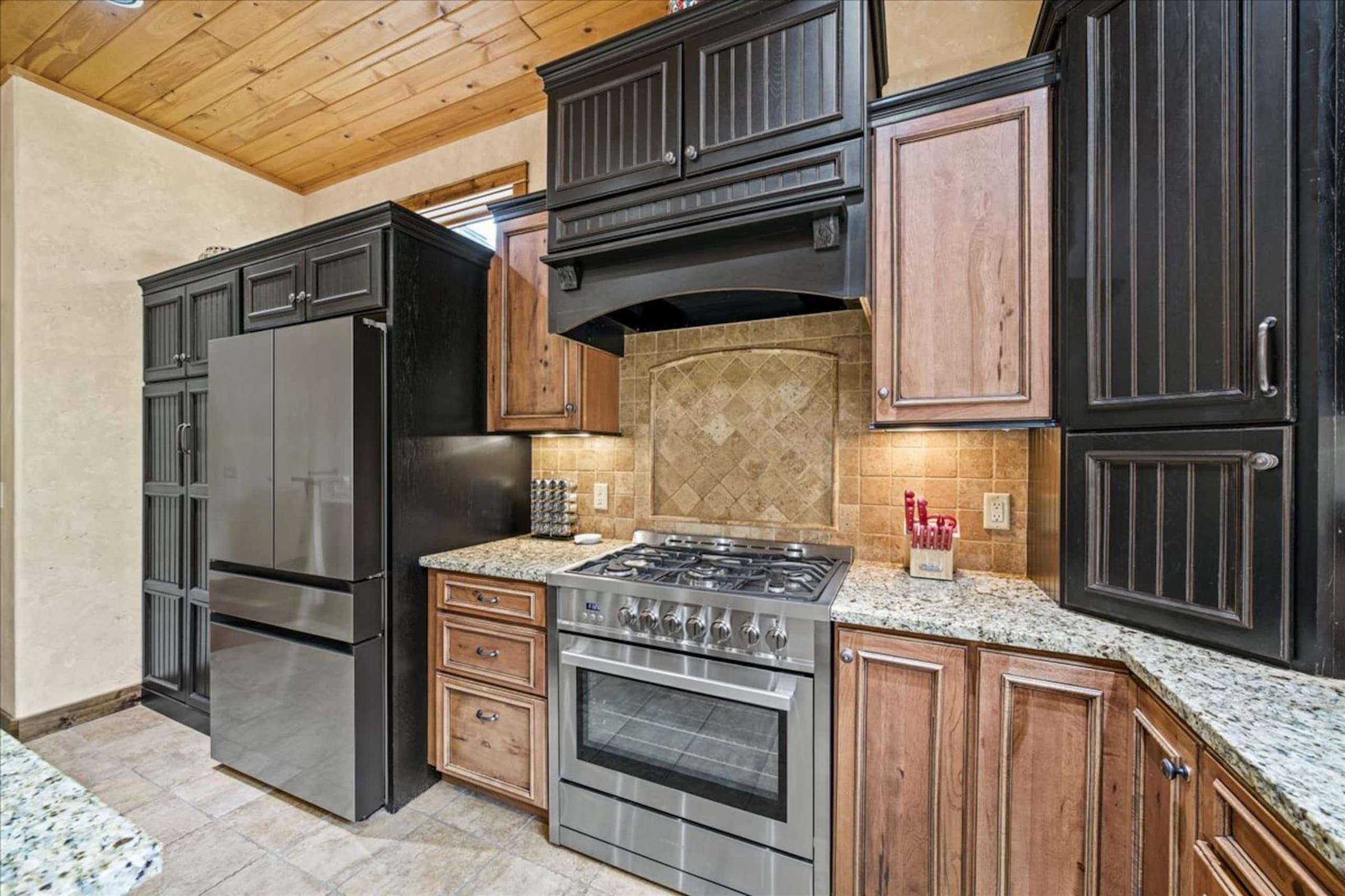 A stainless fridge and range