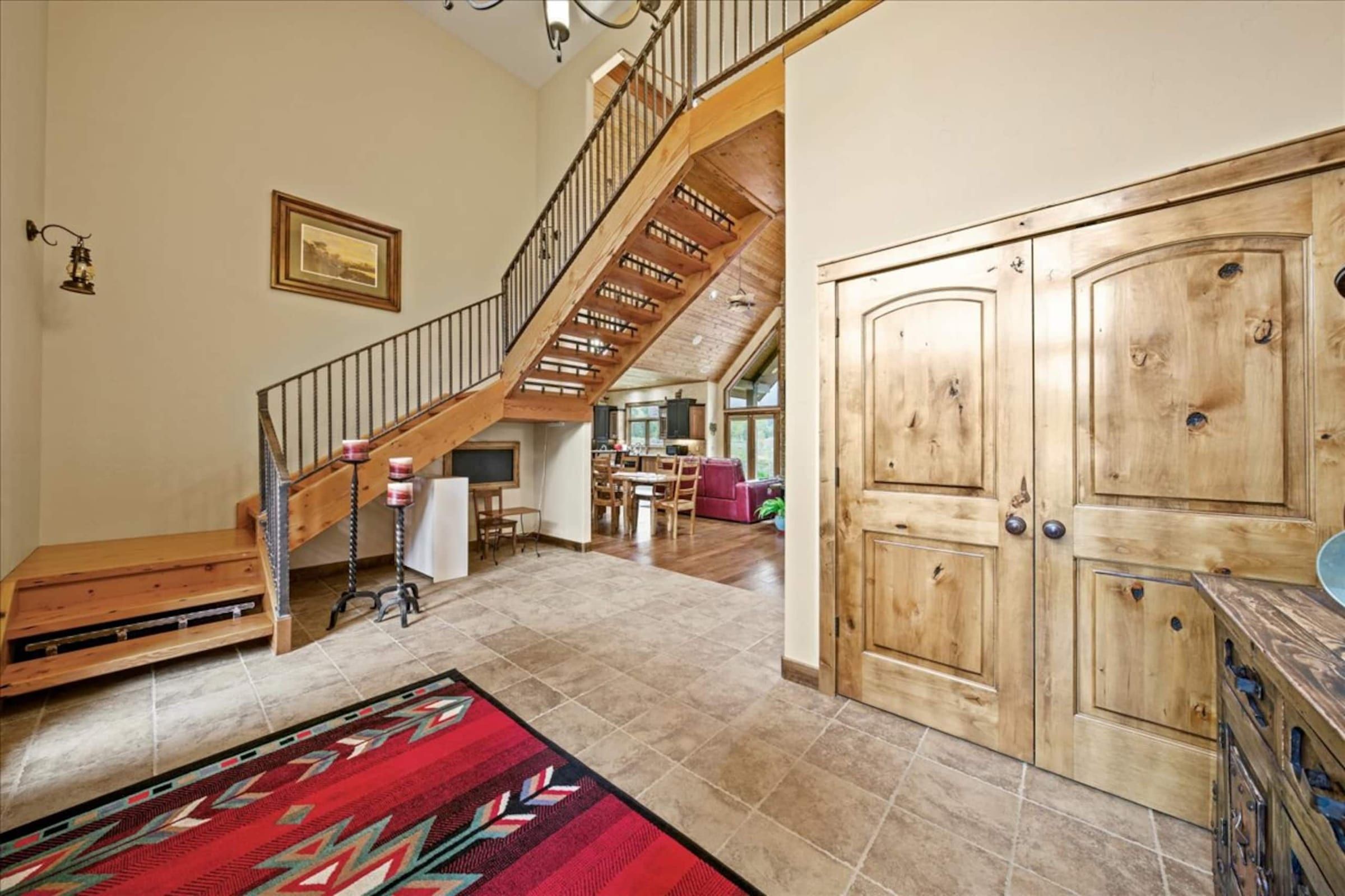 The stairs up and a closet