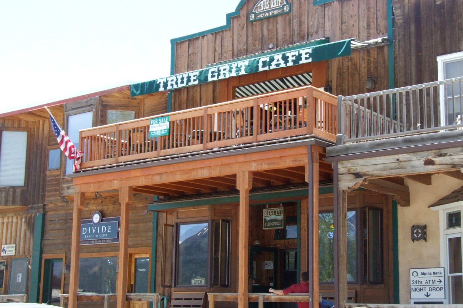 The wooden front and balcony of the True Grit Cafe in Ridgway